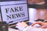 Fake news on laptop screen (Image: memyselfaneye/Pixabay)