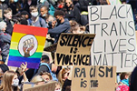 Protesters holding signs at Black Lives Matter protest, part of Georgia Tech Library's Black Lives Matter Reading Room collection