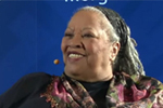 Toni Morrison smiling against a blue background