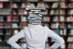 Librarian with stack of books for a head (Image: Gerd Altmann/Pixabay )