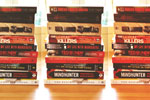 Stacks of true crime books