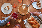 Table with pumpkin pie and bread