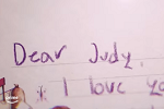 Handwritten letter that reads, Dear Judy, I love you