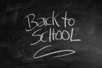 Back to School written in chalk on a blackboard