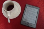 Kindle e-reader with a cup of coffee