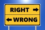 Photo of a sign that point to right and to wrong