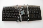 Keyboard wrapped in a locked chain