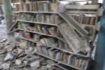 bookshelves at Gaza City Municipal Public Library after airstrikes