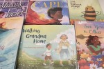 Montage of children's picture books that address grief