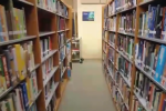 Library shelves at Green Hill High School, in a screencap from WZTV