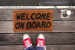 Welcome mat that reads Welcome on Board