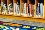 Children's books on a shelf