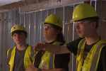 Shikellamy Area High School construction trades students tour the library they are renovating