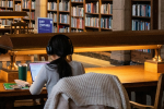 Student studying in a library