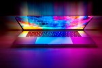 Laptop with a screen emitting colorful light