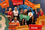 2025 AASL National Conference attendees with colorful signs