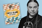 Sean Sherman with the cover of his new cookbook Turtle Island