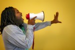 Man shouting into a megaphone