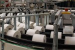 Tissue paper being manufactured on an automated assembly line